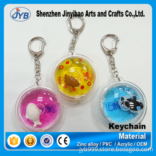 custom fashion floating acrylic keyring round shape liquid inside keychain